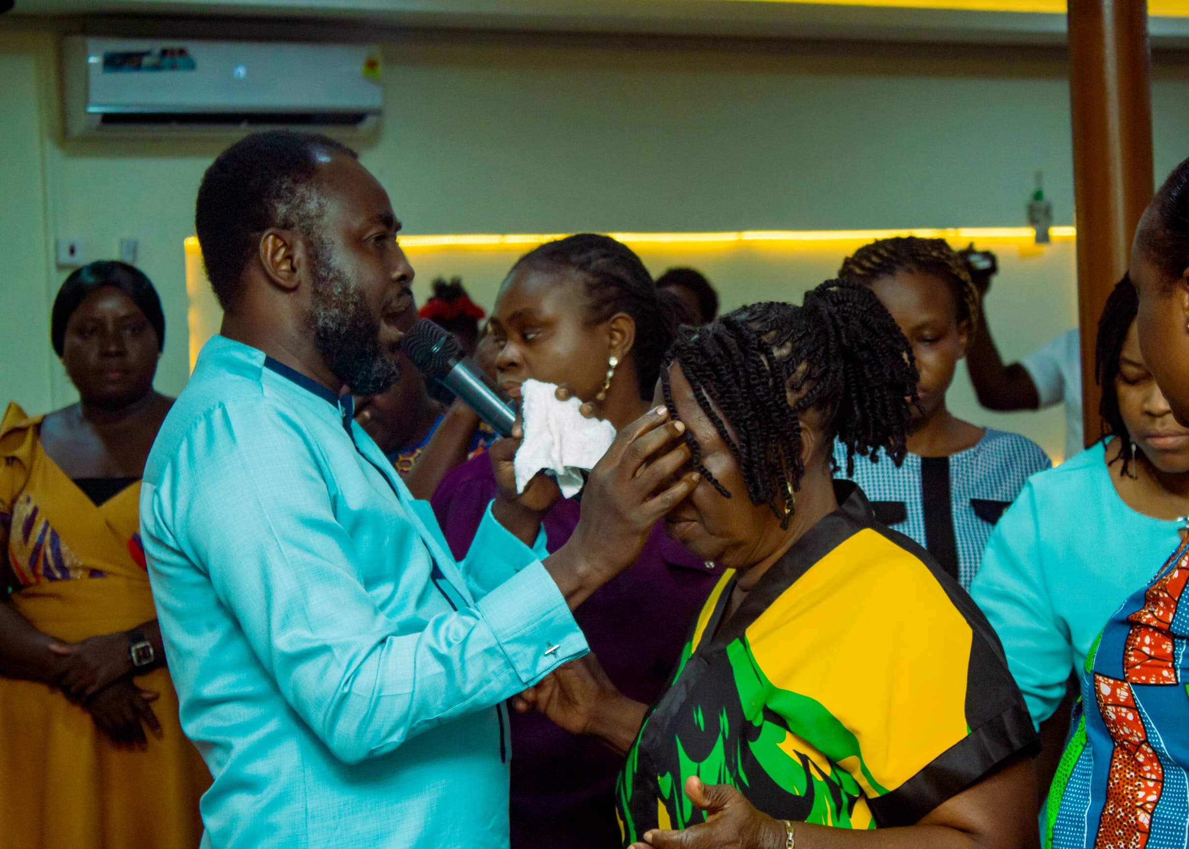 Apostle Benjamin Asamoah ministering during a prayer service