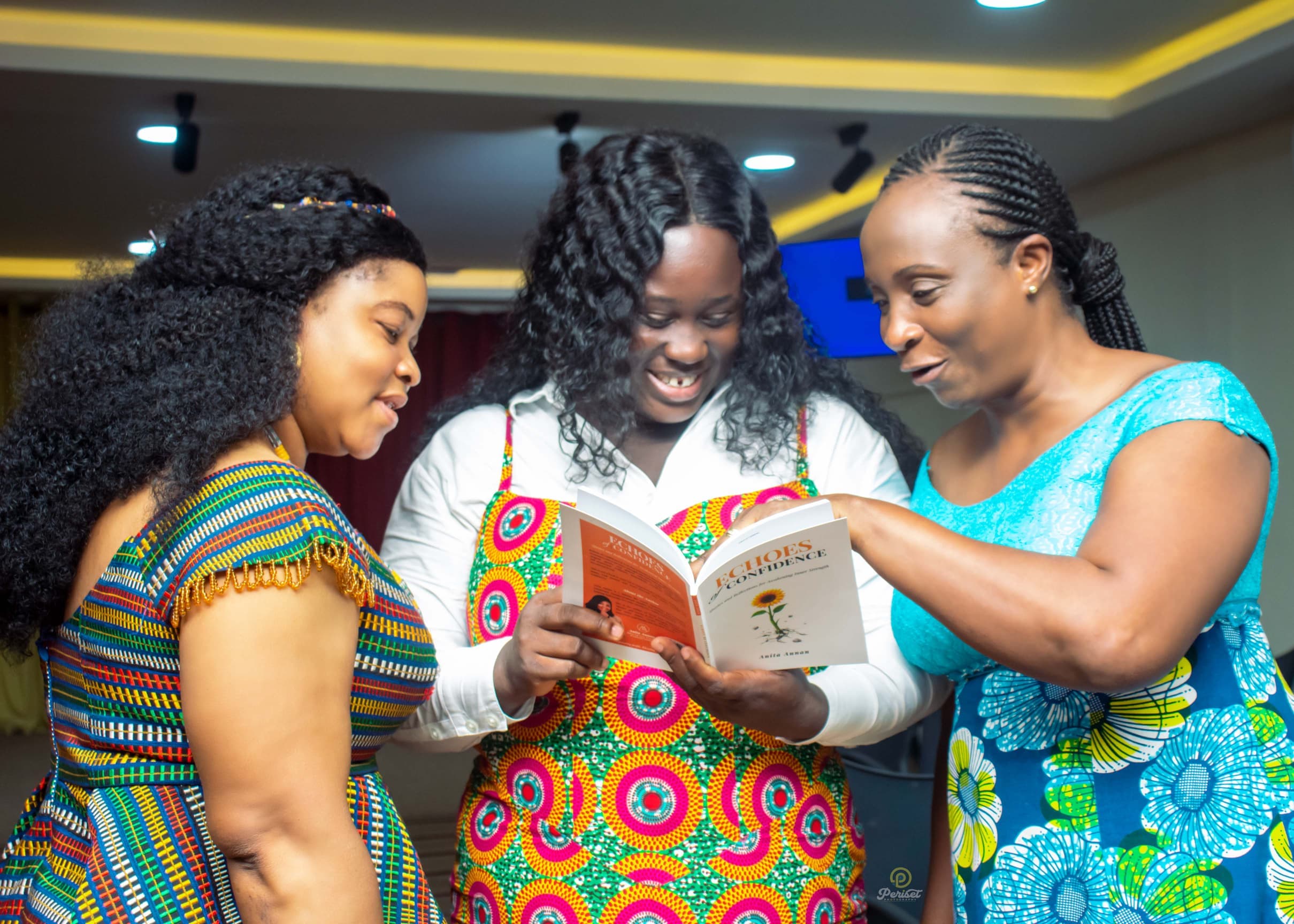 Women reading Echoes of Confidence together at a church event